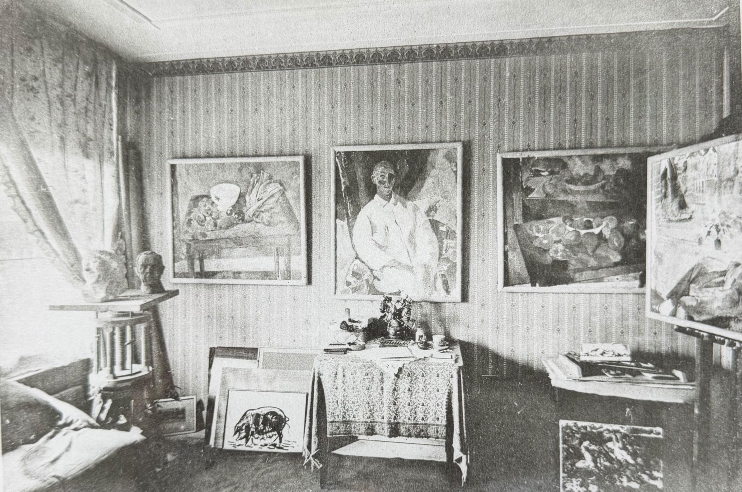 Interior of the Wouters' Amsterdam apartment hung with paintings and plaster busts