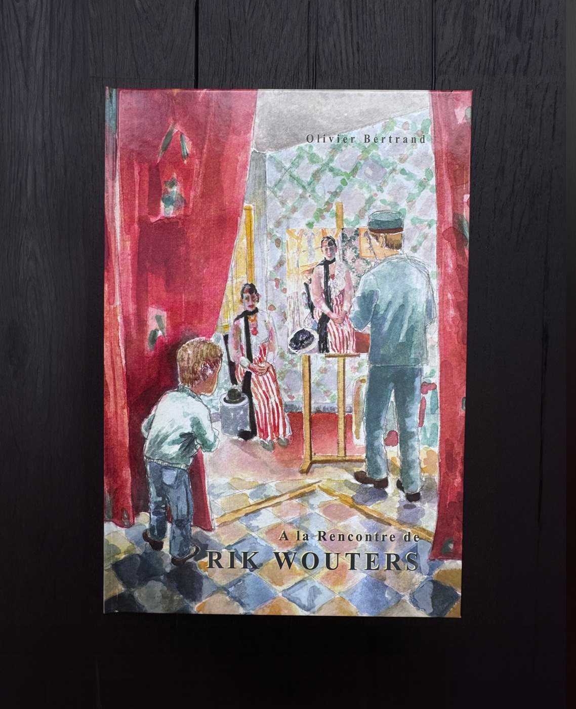 Cover of A la Rencontre de Rik Wouters, a watercolour of a boy watching the artist paint
